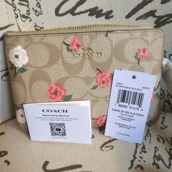 Coach Handbags - COACH Corner Zip Wristlet in Signature Canvas with Floral Print NWT